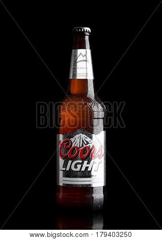 London,uk - March 30, 2017 : Bottle Of Coors Light Beer On Black. Coors Operates A Brewery In Golden