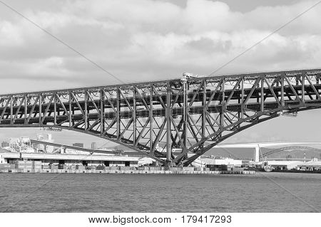 Black and White Minato Bridge cross the sea in Osaka Japan