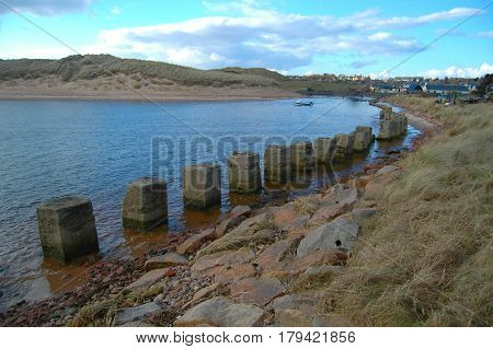 A Row of Tank Stoppers in Port Errol, Aberdeenshire