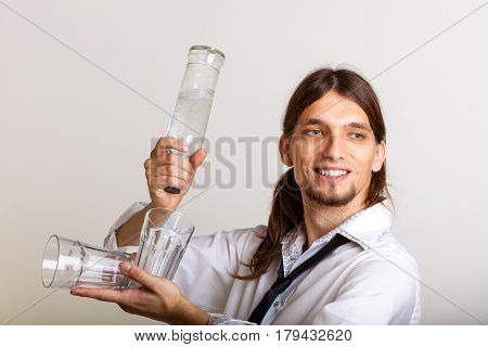 Bartender Fills Glass From Bottle.