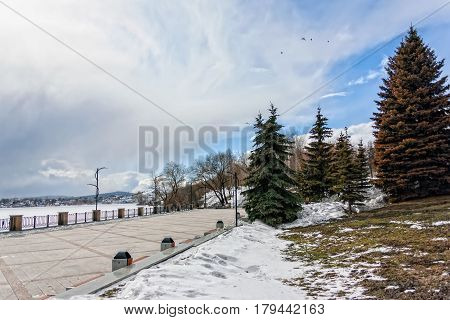 View of quay wharf embankment Ural Nizhny Tagil City. Winter.