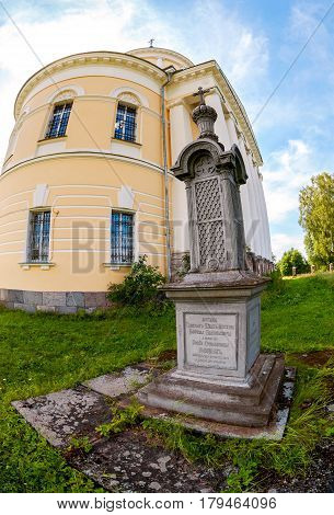 Temple of the Resurrection and old tombstone in the village of Seltso-Karelian Tver region Russia. Cathedral was founded in 1847