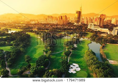 Golf course in the city of Shenzhen in the evening