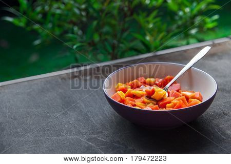 Healthy Vegan Breakfast Of Raw Tropical Fruits.