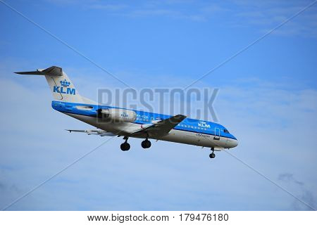Amsterdam the Netherlands - July 15th 2016:PH-KZK KLM Cityhopper Fokker F70 approaching Polderbaan runway at Schiphol Amsterdam Airport arriving from Norwich United Kingdom