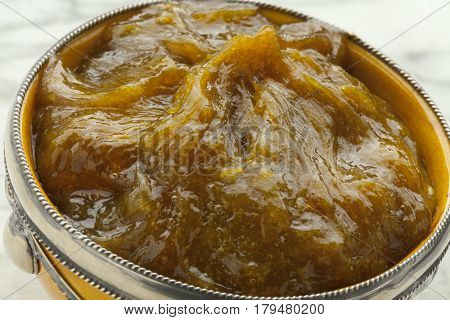 Traditional bowl with Moroccan black argan soap close up