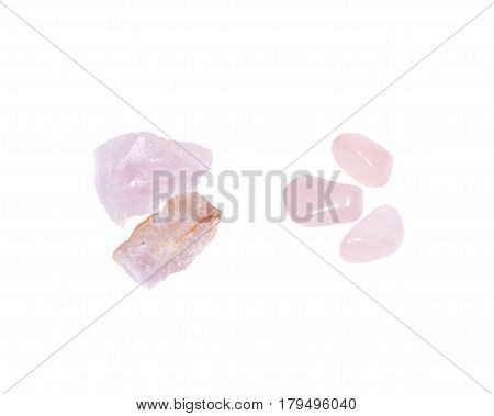 Rose quartz chunks from Madagascar isolated on white background