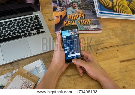 CHIANGMAI THAILAND - JAN 162017:iphone 6s open Twitter with night mode applicationTwitter is an online social networking and microblogging service that enables users to send and read 