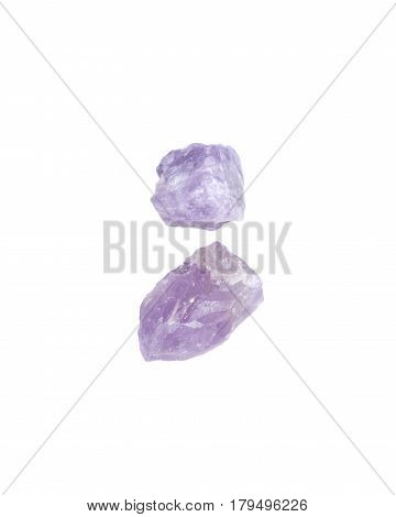 Natural amethyst chunks from Madagascar isolated on white background