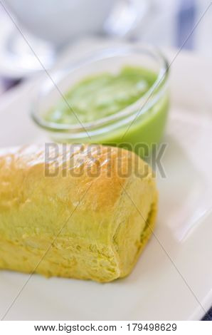 Bread With Pandan Cream On Wooden Board