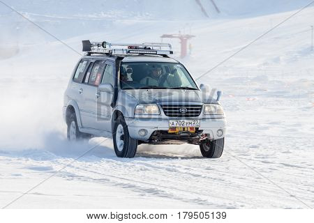 KHABAROVSK RUSSIA - JANUARY 28 2017: Suzuki Escudo riding on snow during local championship