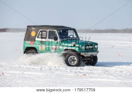 KHABAROVSK RUSSIA - JANUARY 28 2017: UAZ 469 riding on snow during local championship
