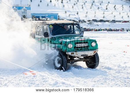 KHABAROVSK RUSSIA - JANUARY 28 2017: UAZ 469 riding on snow during local championship