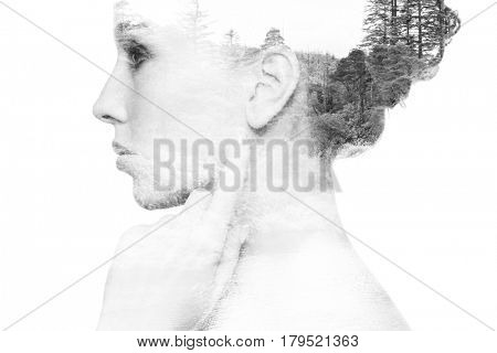 people, nature and beauty concept - beautiful young woman face with natural double exposure effect over white background