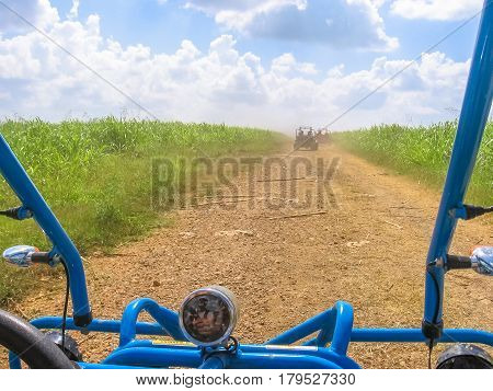 Dirt road of Cumayasa, near La Romana and Catalina Island, from the Buggy. Enjoy the landscapes of Dominican Republic during a Buggy ride. The Buggy ride is a popular tour in Cumayasa area.