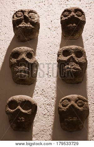 Mexico Oaxaca Santo Domingo monastery museum aztec sculls wall