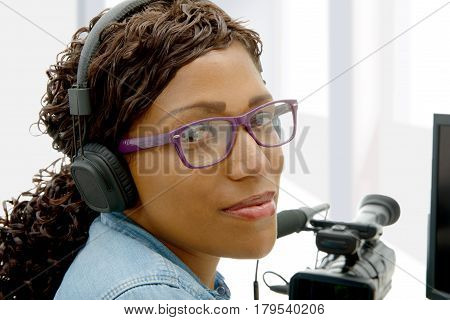 a pretty young African American woman video editor