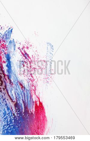 Creativity, abstractionism, abstract modern art, creative painting. Blue and red color mix on white background with free space.