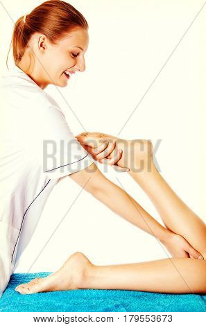 Woman having massage of body in the spa salon. Beauty treatment concept.