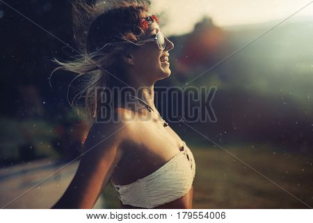 Beautiful hipster woman enjoying summer vaction and freedom