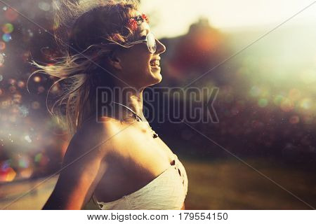 Beautiful hipster woman enjoying summer vaction and freedom