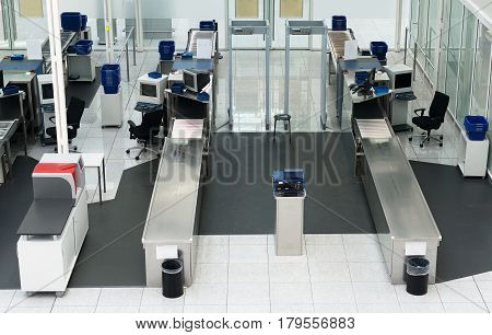 Airport security check point in passenger terminal.