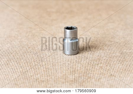 Hex head 10. Hex head for screwdriver. To tool loosening screws bolts and nuts. Picture for illustration a collage.