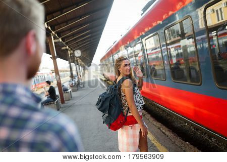 Female says farewall to boyfriend and goes away