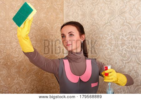 Cleaning servisce lady in rubber gloves