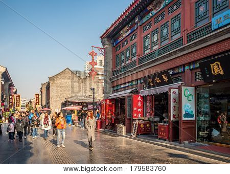 Tianjin, China - Nov 1, 2016: Traditional stores line the famous Tianjin Ancient Cultural Street. Morning scene to what is a very popular tourist area.