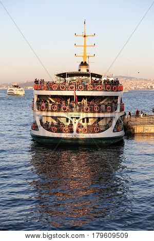 ISTANBUL TURKEY - MARCH 01 2017: Sehir Hatlari ferry in Eminonu Port. Sehir Hatlari was established in 1844 and now carry 150000 passengers a day.