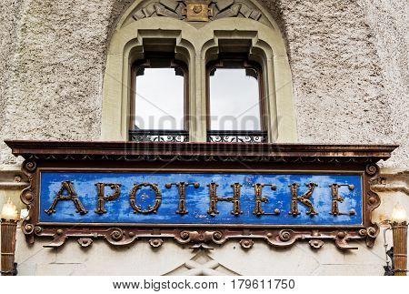 LUCERNE, SWITZERLAND - JUNE 05, 2016: Alte Suidtersche Apotheke medieval signboard  of the oldest pharmacy store in Lucerne was founded in 1833