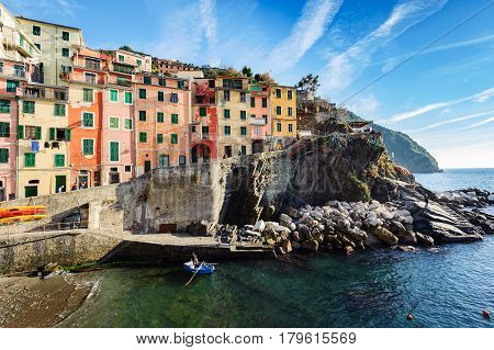 RIOMAGGIORE, ITALY - DECEMBER 2016: View on an architecture of Riomaggiore town. Riomaggiore is one of the most popular towns in Cinque Terre National park, Italy