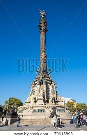 BARCELONA SPAIN - OCTOBER 23 2015: The Columbus Monument is a 60 m tall monument to Christopher Columbus at the lower end of La Rambla Barcelona Catalonia Spain