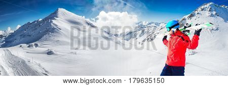Man Enjoying The Stunning View Before Skiing In Famous Ski Resort In Alps