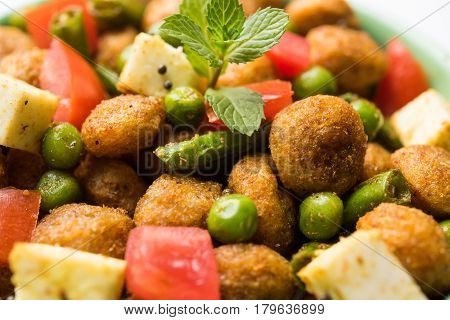 Soya chunks 65 or soya chunk fry is a healthy snack, easy to cook, protein rich, vegetarian dish ideal for starters. popular indian food. selective focus