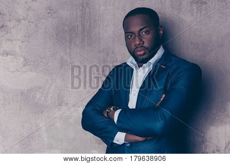 Portrait Of Successful  Handsome Afroamerican Man In Stylish Suit Crossed Hands