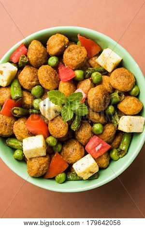 Soya chunks 65 or soya chunk fry is a healthy snack, easy to cook, protein rich, vegetarian dish ideal for starters. popular indian food. selective focus