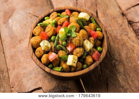 Soya chunks 65 or soya chunk fry is a healthy snack, easy to cook, protein rich, vegetarian dish ideal for starters. popular indian food. selective focus
