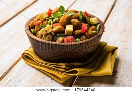 Soya chunks 65 or soya chunk fry is a healthy snack, easy to cook, protein rich, vegetarian dish ideal for starters. popular indian food. selective focus