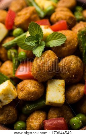 Soya chunks 65 or soya chunk fry is a healthy snack, easy to cook, protein rich, vegetarian dish ideal for starters. popular indian food. selective focus