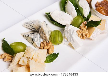 Various cheese type dish served luxery. Close-up, white background, isolated.