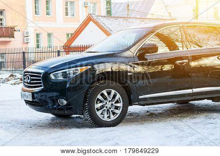 Smolensk, Russia - December 12, 2016: Infiniti QX 60 HYBRID parked in winter street.