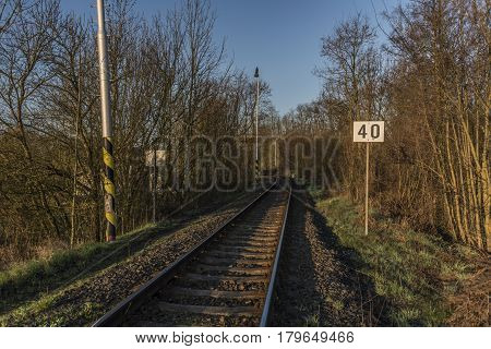 Railway track and bridge in Bakov nad Jizerou area with sunrise