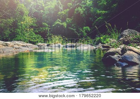 Wallpaper nature Waterfall stream. Water streams of natural forests. thailand Tropical zone