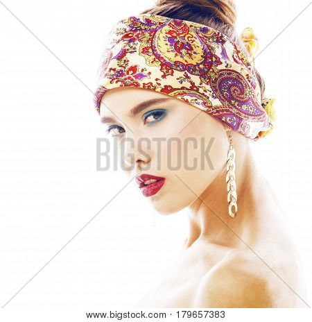 young pretty modern girl with bright shawl on head emotional posing isolated on white background, asian people ethnicity