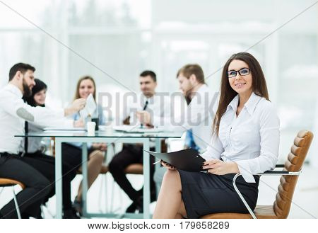 leading lawyer of the company on background, business meeting business partners. the photo has a empty space for your text.