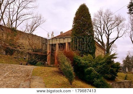 Courtyard Of The Old Medieval Saxon Lutheran Church In Sighisoara, Transylvania, Romania