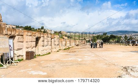 Tourists Near Walls Of Circus Hippodrome In Jerash