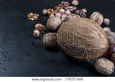 Assorted Nuts On A Black Background